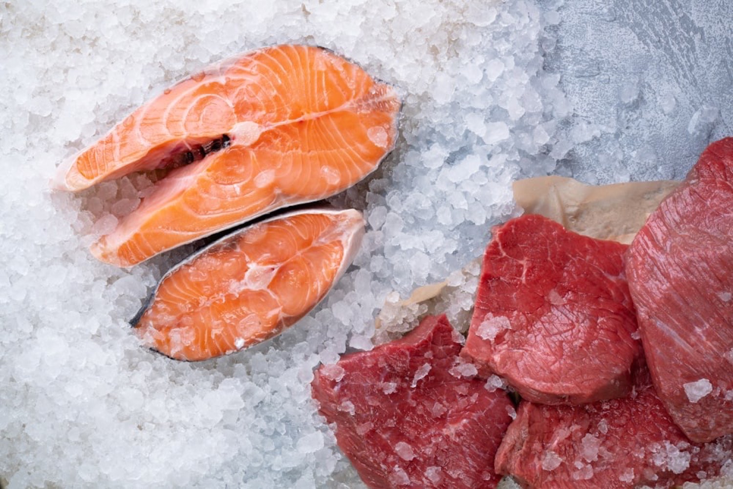 Fresh salmon steaks on a bed of ice